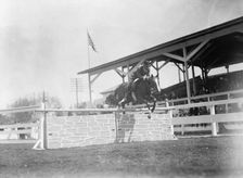 Horse Shows - Melvin Hazen Jumping, 1912. Creator: Harris & Ewing