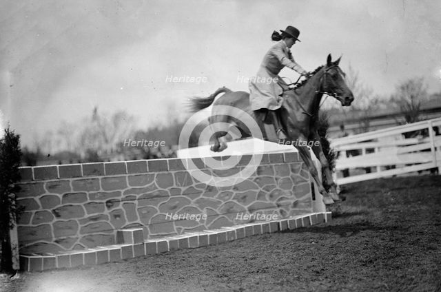 Horse Shows - Miss Martha Hazard, Hurdling And On Foot, 1911. Creator: Harris & Ewing.