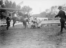Horse Shows - Victor Mather Falling From Pagan Kin 1912. Creator: Harris & Ewing