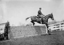Horse Show - Hurdling. Johnston, Gordon, 1st Lt., U.S.A. 7th Cavalry, 1911. Creator: Harris & Ewing