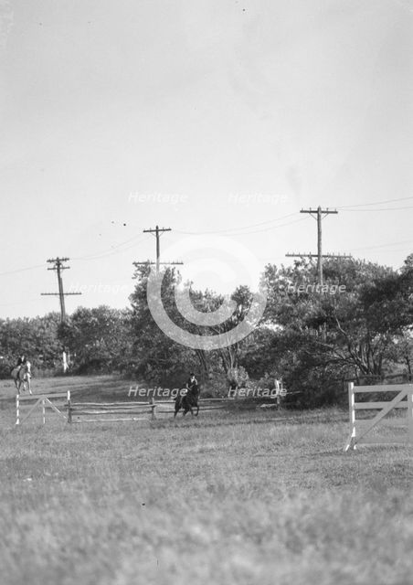 Horse show or show jumping event, between 1911 and 1942. Creator: Arnold Genthe.