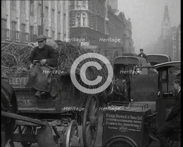 Horses and Carts Riding Through London, 1936. Creator: British Pathe Ltd.
