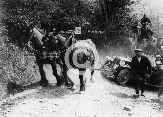 Horses pulling an MG up a hill, c1936. Artist: Unknown