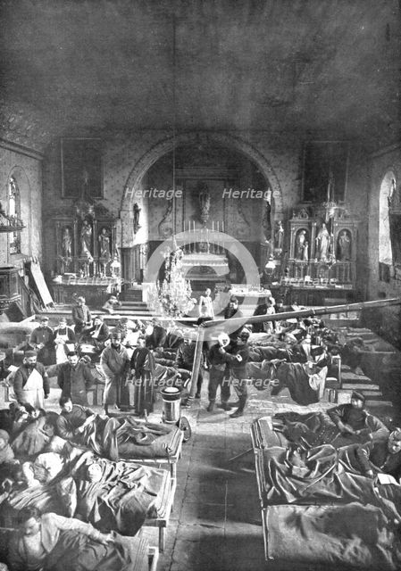 'Hors de portee de l'artillerie allemande; Une ambulance de l'avant, dans une eglise', 1915. Creator: Unknown.