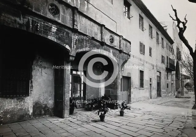 Hospital de la Santa Cruz, Barcelona: a long view of the courtyard. Creator: Unknown.