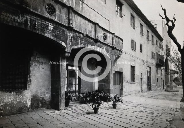 Hospital de la Santa Cruz, Barcelona: a long view of the courtyard. Creator: Unknown.