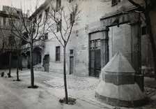 Hospital de la Santa Cruz, Barcelona: a long view of the courtyard; to the right can be seen the... Creator: Unknown