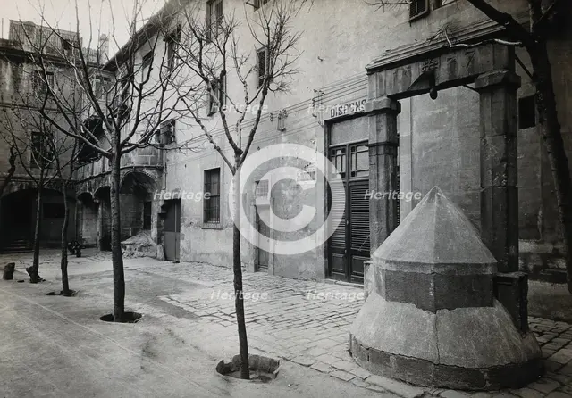 Hospital de la Santa Cruz, Barcelona: a long view of the courtyard; to the right can be seen the... Creator: Unknown.