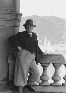 Hauptmann, Gerhart, standing outdoors, 1938 Creator: Arnold Genthe