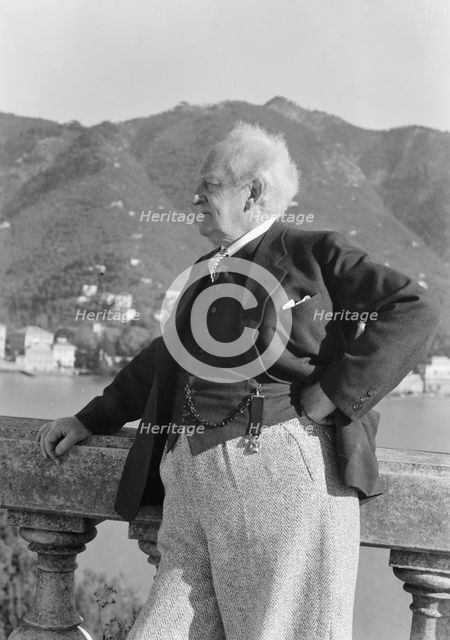 Hauptmann, Gerhart, standing outdoors, 1938 Creator: Arnold Genthe.