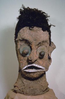 Hawaiian mask with human hair