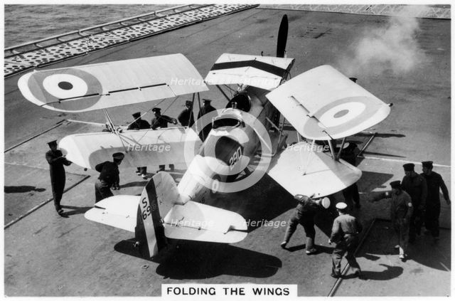Hawker Osprey on the deck of the aircraft carrier HMS 'Eagle', 1937. Artist: Unknown