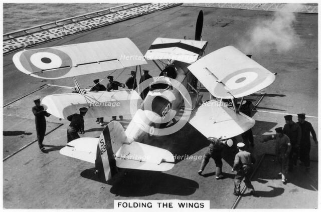 Hawker Osprey on the deck of the aircraft carrier HMS 'Eagle', 1937. Artist: Unknown