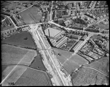 Hazelhurst Cotton Mill and the East Lancashire Road (A580) under construction, Hazelhurst, c1930s. Creator: Arthur William Hobart
