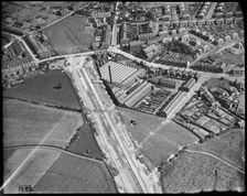 Hazelhurst Cotton Mill and the East Lancashire Road (A580) under construction, Hazelhurst, c1930s. Creator: Arthur William Hobart