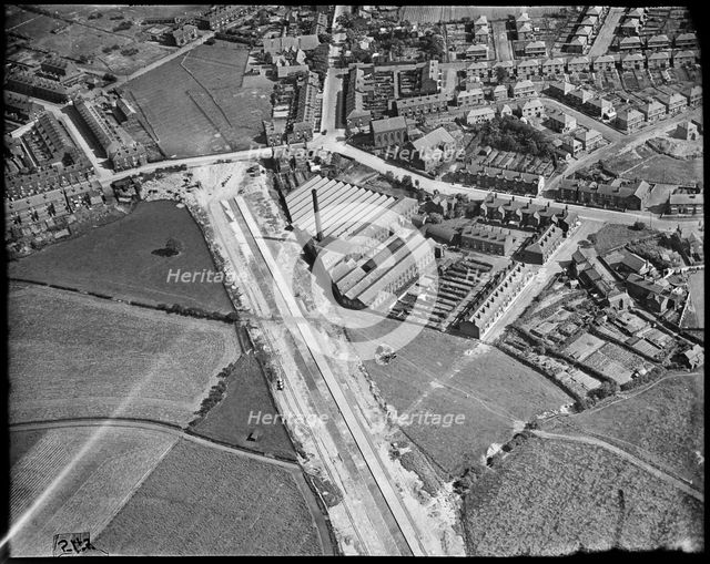 Hazelhurst Cotton Mill and the East Lancashire Road (A580)  under construction, Hazelhurst, c1930s. Creator: Arthur William Hobart.