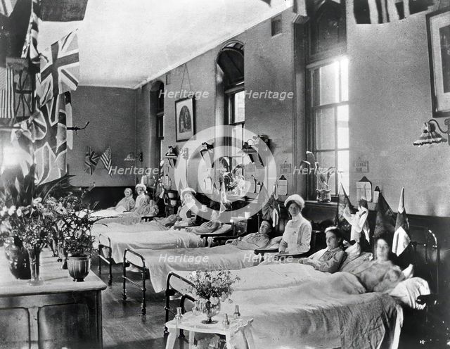 Hahnemann Hospital and Homeopathic Dispensaries, Liverpool: a women's ward, decorated..., [1910?]. Creator: Unknown.