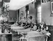 Hahnemann Hospital and Homeopathic Dispensaries, Liverpool: a women's ward, decorated..., [1910?]. Creator: Unknown