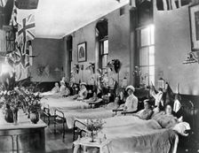 Hahnemann Hospital and Homeopathic Dispensaries, Liverpool: a women's ward, decorated..., [1910?]. Creator: Unknown
