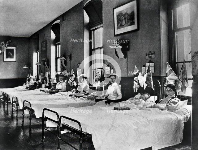Hahnemann Hospital and Homeopathic Dispensaries, Liverpool: a women's ward, decorated..., [1910?]. Creator: Unknown.