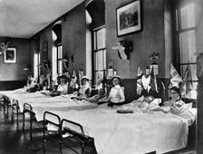 Hahnemann Hospital and Homeopathic Dispensaries, Liverpool: a women's ward, decorated..., [1910?]. Creator: Unknown