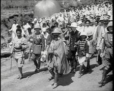 Haile Selassie I, Emperor of Ethiopia Walking with a Crowd, 1930s. Creator: British Pathe Ltd