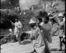 Haile Selassie I, Emperor of Ethiopia Walking with a Crowd, 1930s. Creator: British Pathe Ltd