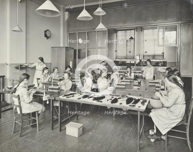 Hair dressing class, Barrett Street Trade School for Girls, London, 1915. Artist: Unknown.