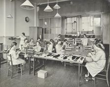 Hair dressing class, Barrett Street Trade School for Girls, London, 1915