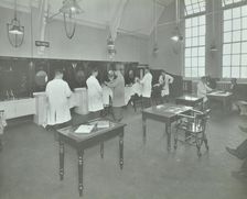 Hair dressing class for men at the Bromley Non-Residential Training Centre, London, 1934