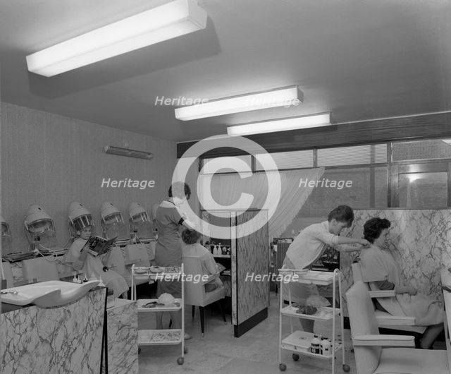 Hairdressers at work, Armthorpe, near Doncaster, South Yorkshire, 1961. Creator: Michael Walters.