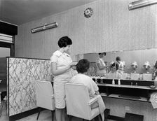 Hairdressers salon, Armthorpe, near Doncaster, South Yorkshire, 1961. Creator: Michael Walters