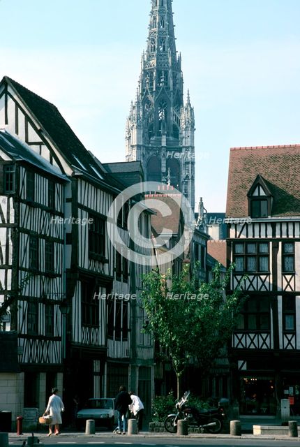 Half-timbered houses with St Maclou Church in the background, Rouen, Normandy, France. Creator: Frank Naylor.
