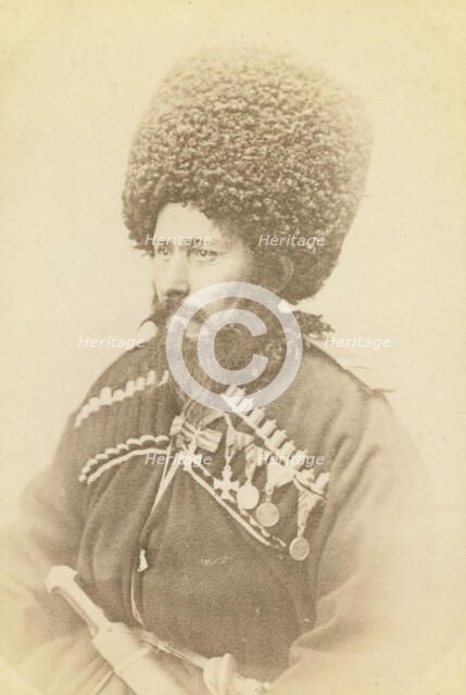 Half-length portrait of Daghestani man, facing left, between 1870 and 1886. Creator: Unknown.