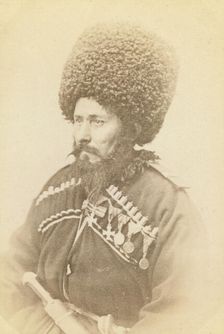 Half-length portrait of Daghestani man, facing left, between 1870 and 1886. Creator: Unknown
