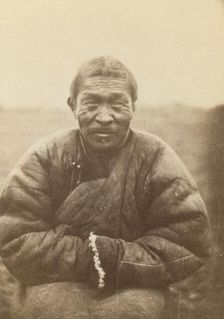 Half-length portrait of man, seated, facing front, between 1870 and 1886. Creator: Unknown