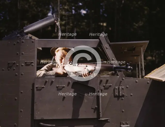 Halftrack infantryman with Garand rifle, Ft. Knox, Ky., 1942. Creator: Alfred T Palmer.
