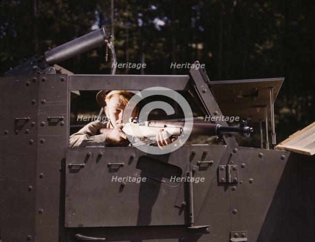 Halftrack infantryman with Garand rifle, Ft. Knox, Ky., 1942. Creator: Alfred T Palmer.