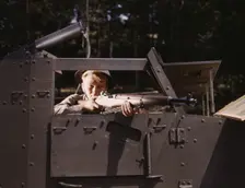 Halftrack infantryman with Garand rifle, Ft. Knox, Ky., 1942. Creator: Alfred T Palmer