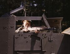 Halftrack infantryman with Garand rifle, Ft. Knox, Ky., 1942. Creator: Alfred T Palmer