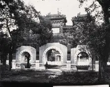 Hall of Classics (Guozijian), Peking: a triple archway of sculpted marble leading... 1871, (1981). Creator: Unknown