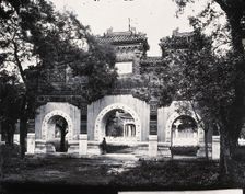 Hall of Classics (Guozijian), Peking: a triple archway of sculpted marble leading... 1871, (1981). Creator: Unknown