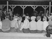 Halloween party at Shafter camp for migrants, California, 1938. Creator: Dorothea Lange