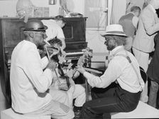 Halloween party at Shafter camp for migrants, California, 1938. Creator: Dorothea Lange