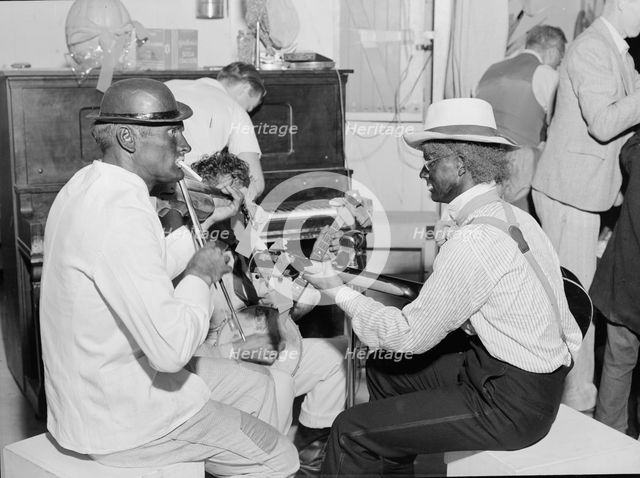 Halloween party at Shafter camp for migrants, California, 1938. Creator: Dorothea Lange.