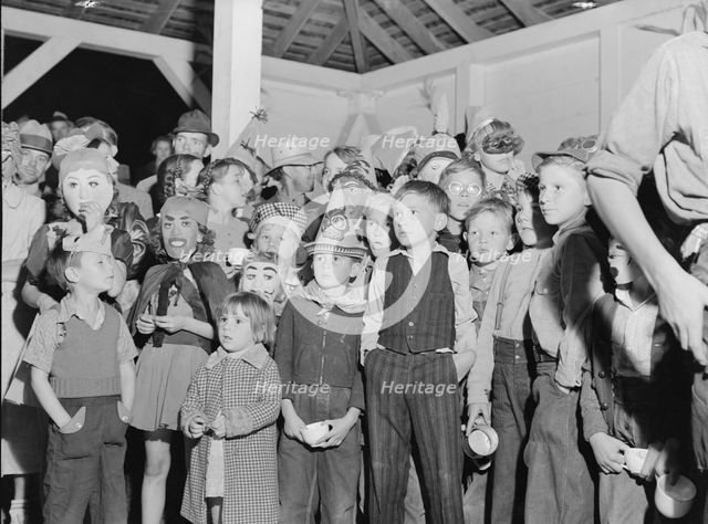 Halloween party at Shafter migrant camp, California, 1938. Creator: Dorothea Lange.