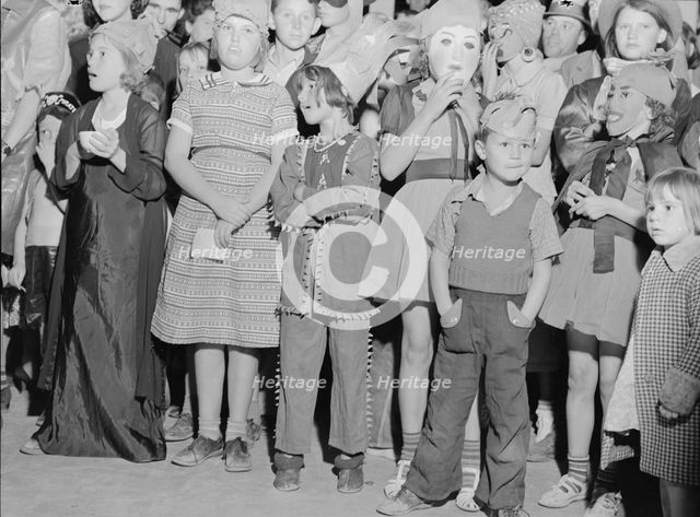 Halloween party at Shafter migrant camp, California, 1938. Creator: Dorothea Lange.
