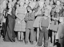 Halloween party at Shafter migrant camp, California, 1938. Creator: Dorothea Lange
