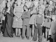Halloween party at Shafter migrant camp, California, 1938. Creator: Dorothea Lange