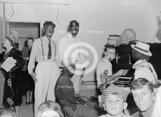 Halloween party, Shafter, California, 1938. Creator: Dorothea Lange.